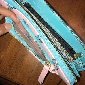 Pink and blue cactus wallet.